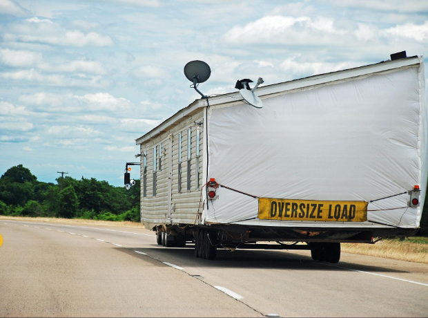 Transporting modulars can be difficult without the right protection. Here’s why string reinforced plastic sheeting might be a great solution.