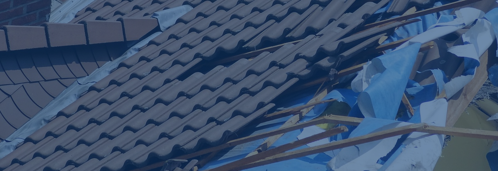 image of a damaged roof waiting for repairs